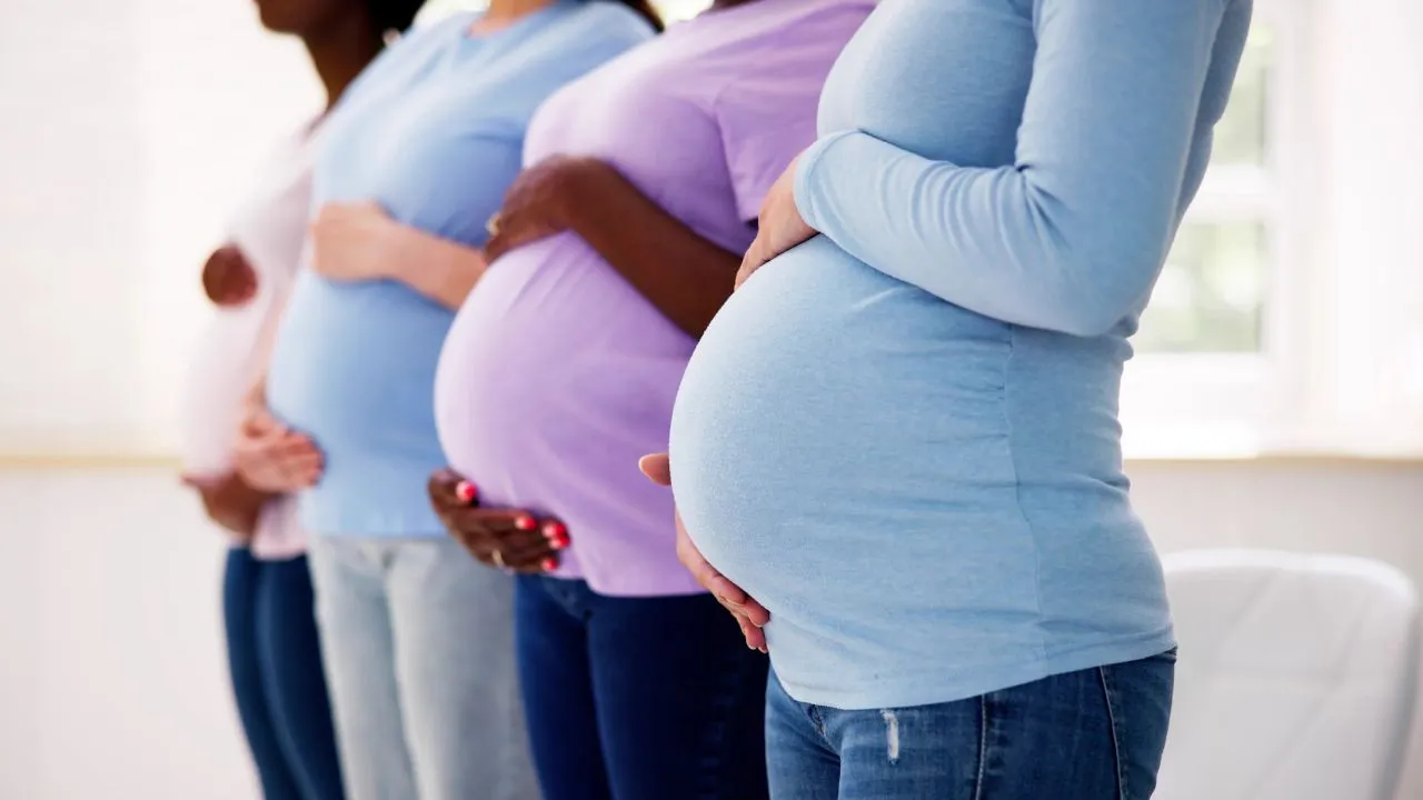 nurses pregnant holding bellies